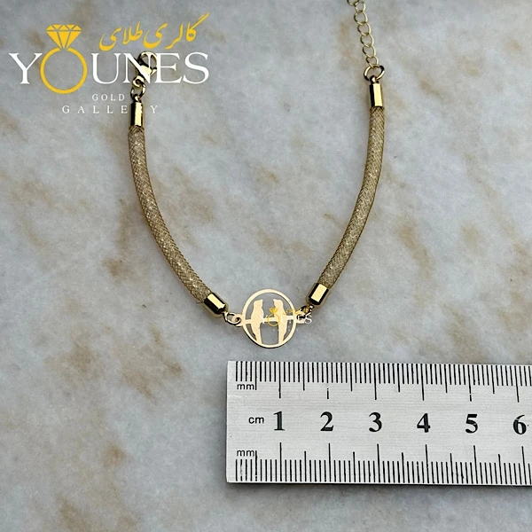 دستبند طلا سواروسکی مرغ عشق